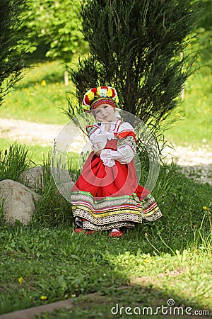 Girl in russian traditional folk clothes Stock Photo