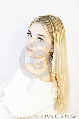 The girl`s face is a blonde. Close-up. Facial care Stock Photo