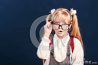 Girl school eyeglasses portrait backpack Stock Photo