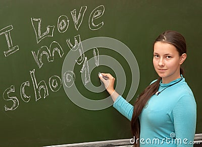 Girl schoolgirl meets an English lesson Stock Photo