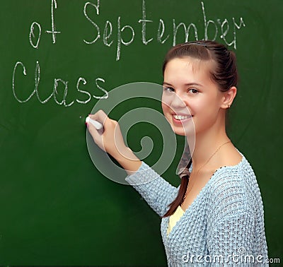 Girl schoolgirl meets an English lesson Stock Photo