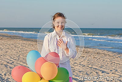 Girl seventeen-year-old with Down syndrome. Stock Photo