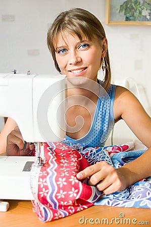 The girl sews Stock Photo