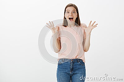 Girl sharing outstanding achievement, cannot hide happiness. Portrait of joyful pleased cute woman in trendy t-shirt Stock Photo