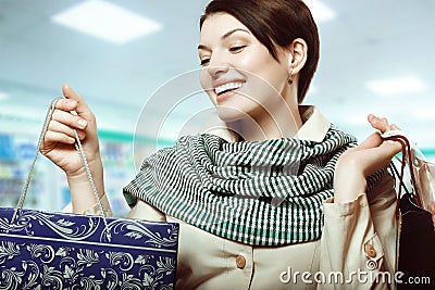 Girl with shopping in bags, Shopaholic Stock Photo
