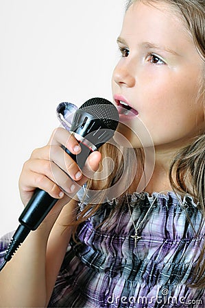 Girl sings a christian song Stock Photo