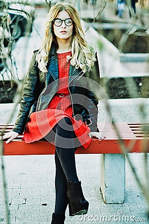 Girl Sitting on Bench Stock Photo