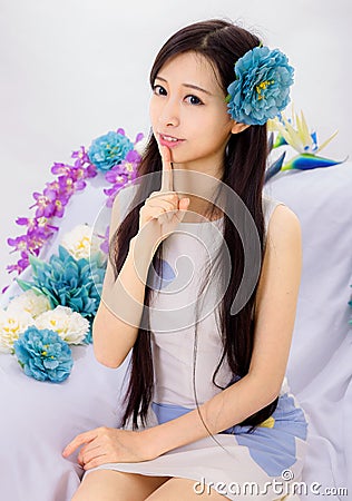 http://thumbs.dreamstime.com/x/girl-sitting-flower-sofa-asian-make-up-spa-model-flowers-45263845.jpg