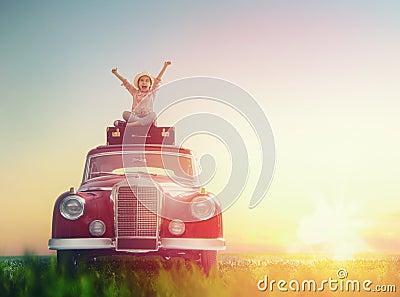 Girl sitting on roof of car. Stock Photo