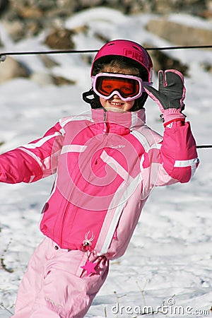Girl ski skiing smiling winter snow rest vocation pink children kid trip travel Editorial Stock Photo
