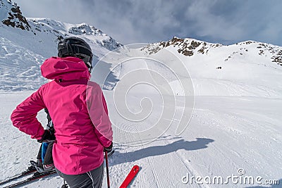 Girl skier watching empty slope in Solden ski resort, Solden, Austria, Europe Stock Photo