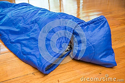 Girl in sleeping bag for camping Stock Photo