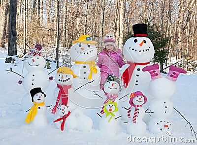 Girl with snowmen Stock Photo