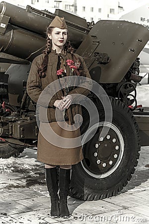 Girl in a Soviet military uniform Stock Photo