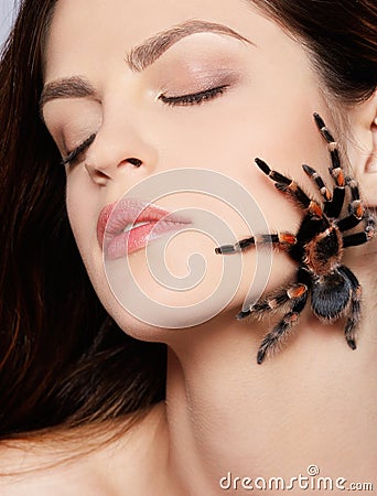 Girl with spider Stock Photo