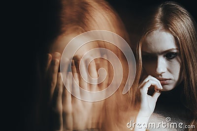 Girl with split personality disorder Stock Photo