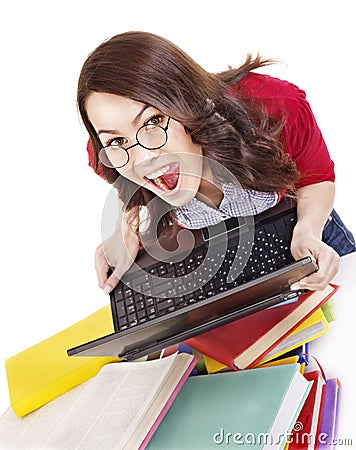 Girl with stack color book and laptop. Stock Photo