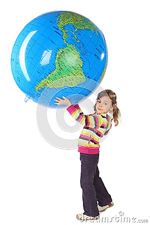 Girl standing and holding big inflatable globe Stock Photo