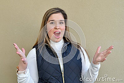 Girl stares into space daydreaming. Stock Photo