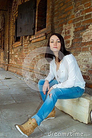 Girl on a stone Stock Photo