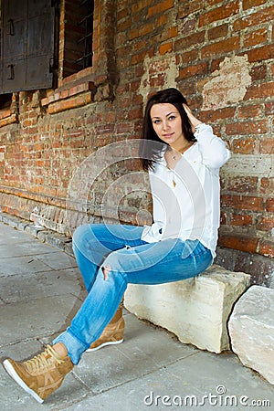 Girl on a stone Stock Photo