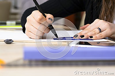 The girl student is preparing a plan. Architectural University Stock Photo