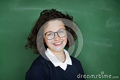 Girl student smiling and blackboard Stock Photo