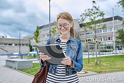 Girl student teenager outdoor near school building Stock Photo