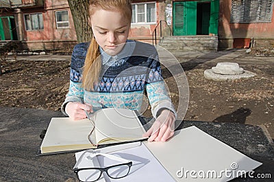 Girl student writing work Stock Photo