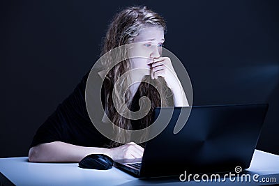 Girl suffering from electronic aggression Stock Photo