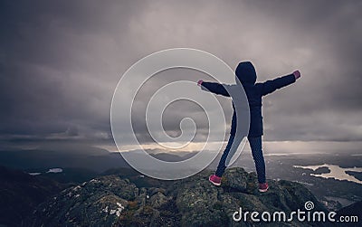 Girl at the summit of Mount Ulriken Stock Photo