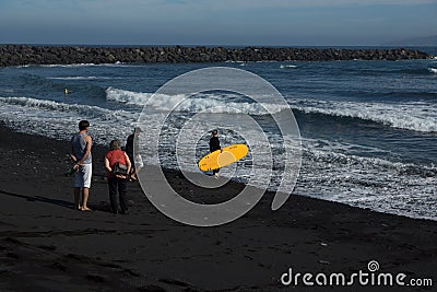 Girl surfer goes to the ocean Editorial Stock Photo