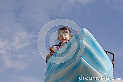 Girl on Swan Ride Stock Photo