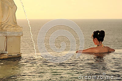 Girl Swimming In A Pool Stock Photo