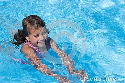 The girl swims. Stock Photo