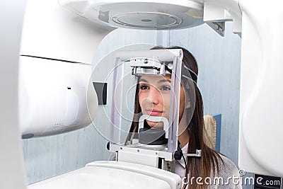 Girl taking digital 3D panoramic dental x-ray. Stock Photo