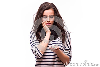 Girl taking pills from head pain, cough, illness Stock Photo