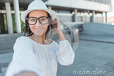 Girl taking selfie. Young happy woman Stock Photo