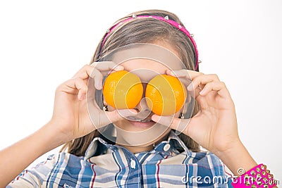 Girl and tangerines. Stock Photo
