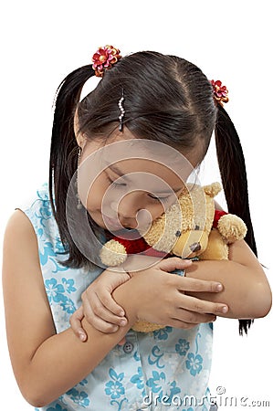 Girl with a teddy bear Stock Photo