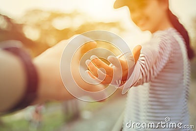 Girl teen smiling and reach her hand. Help Touch Care Support be a Good Friend with Love concept Stock Photo