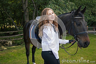 Girl teenager with a horse Stock Photo