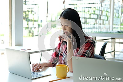 Girl teenager college high school student studying with computer Stock Photo