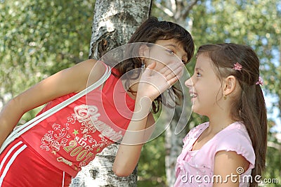 Girl Telling A Joke Stock Photo