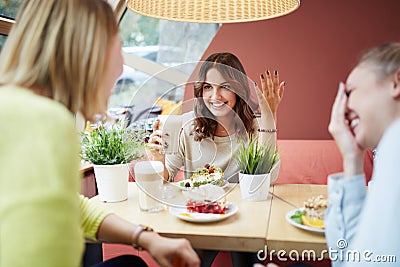 Girl telling jokes Stock Photo