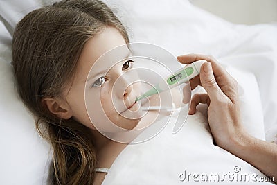 Girl With Thermometer In Mouth Stock Photo