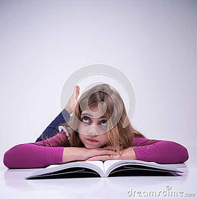 Girl thinking about what she studied Stock Photo