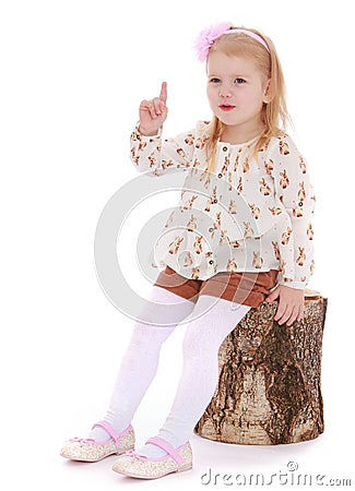 The girl threatens with a finger Stock Photo