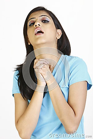 Girl with throat pain Stock Photo