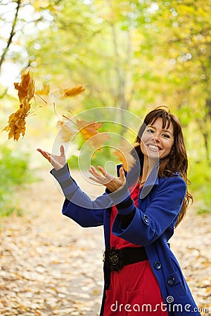 Girl Throw Up Maple Leaves Stock Images - Image: 21379944
